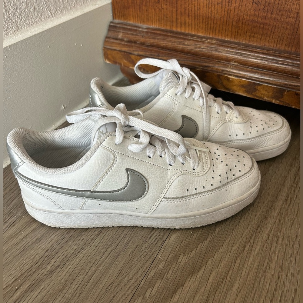 Nike White Low Top Sneakers with Silver Accent